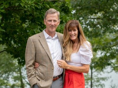 Peter and Stephanie Nolan outside of their home at Cayuga Lake.