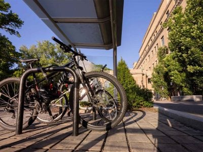 Bikes outside Warren Hall in summer.