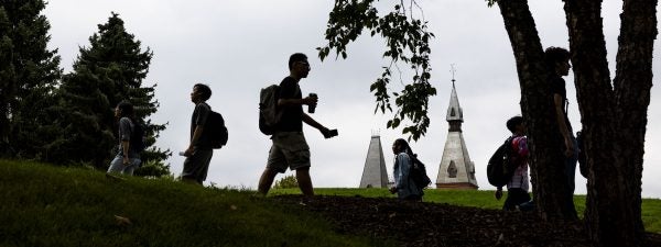 Students walking in front of Sage Hall