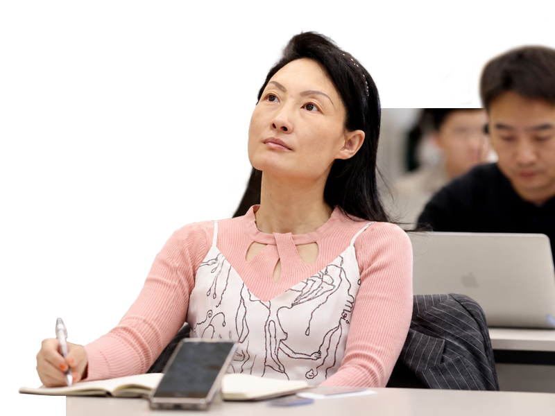 Classroom shot in Tsingua. Woman and male students