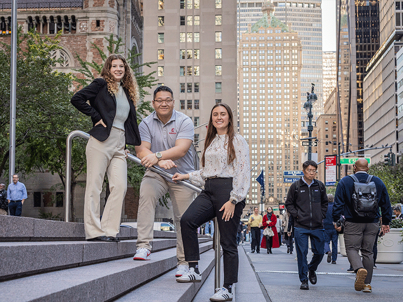 Real estate students in NYC near Lexington avenue on steps