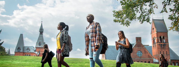 Students walk up Libe Slope in fall.