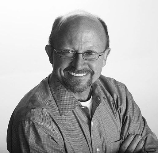 Headshot of Greg McCann.