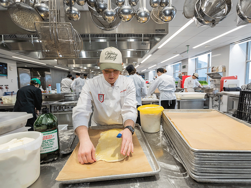 Lead kitchen MMH manager in new nolan kitchen at work for HEC