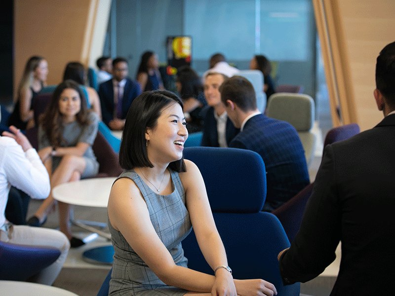 female student in lounge in business attire
