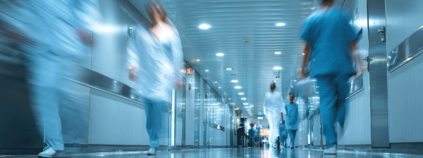 busy blue tinted hospital corridor