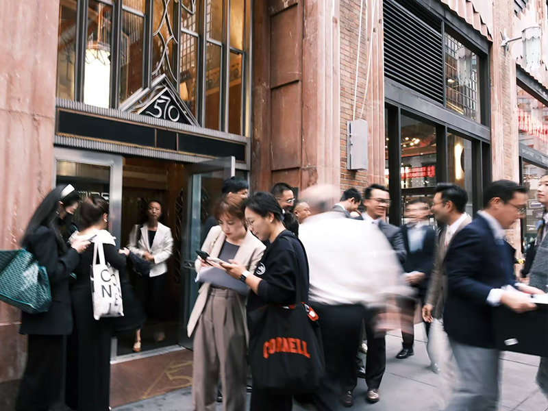 New York City Street scene. 570 Lexington ave, group in action, blurred