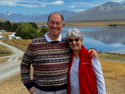 Gail and Roberto Cañizares ’71, MBA ’74 in front of a mountain range