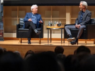 Nobel Prize-winning economist and former Cornell professor Richard Thaler, left, speaks on stage with Thomas Gilovich, the Irene Becker Rosenfeld Professor of Psychology, in the Statler Auditorium.