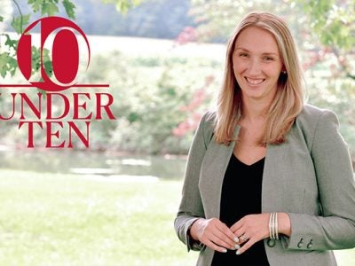 upper body photo of Anna Richards with a spring garden in the background