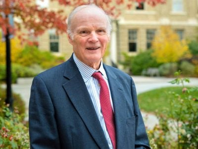 Stephen Ashley posing outside on the Cornell campus