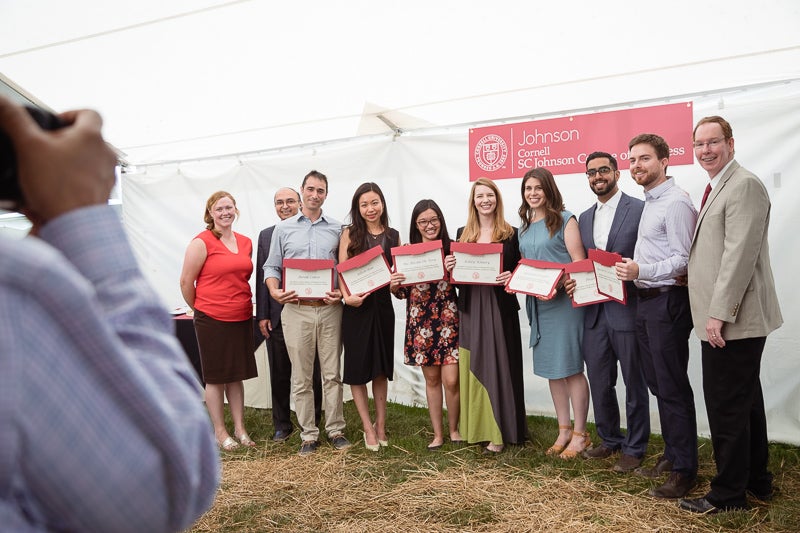Photo of awardees holding certificates