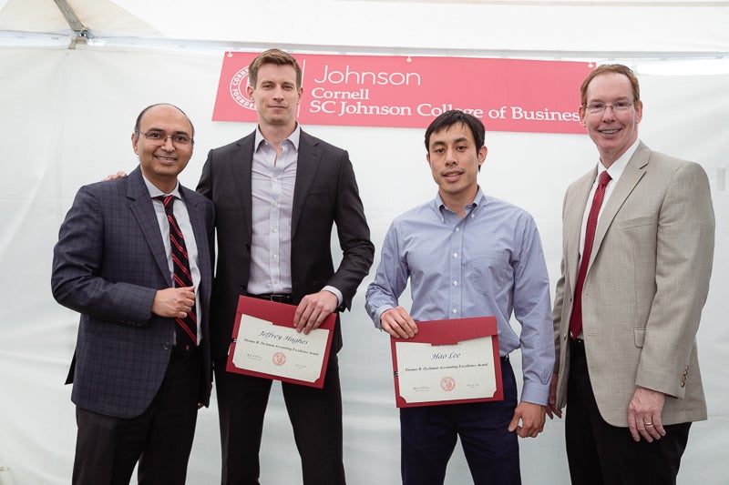 Photo of awardees holding certificates