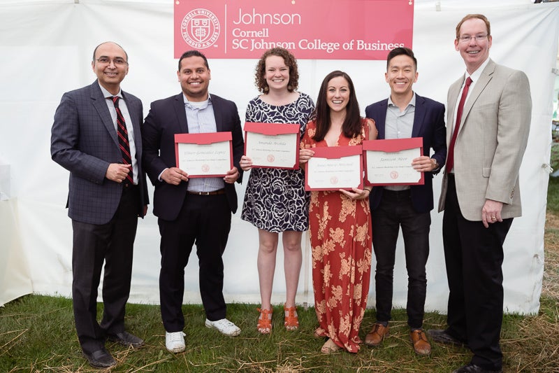 Photo of awardees holding certificates