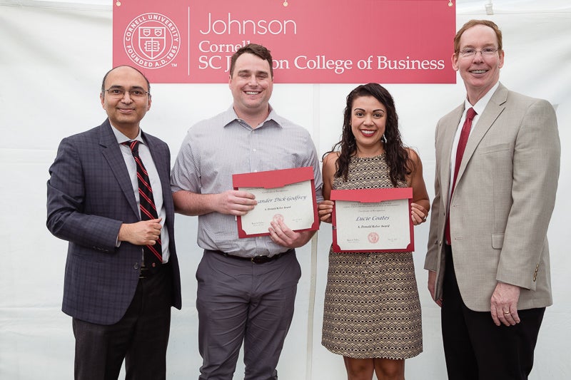 Photo of graduates holding certificates