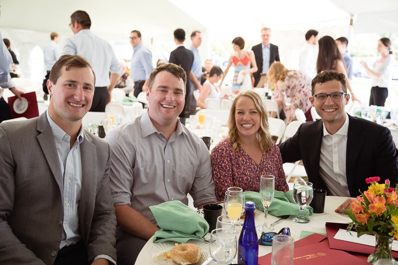 Photo of people seated at a table