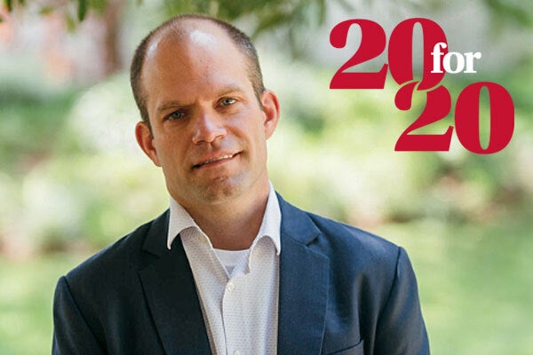 Headshot of CJ Fonzi with the 20 for 20 graphic identifier placed next to him on the photo.