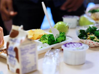 Image of students at City Honors School in Buffalo, New York, eat lunch on a “New York Thursday,” a weekly effort to promote the foods in the lunches that are grown or produced in New York State.
