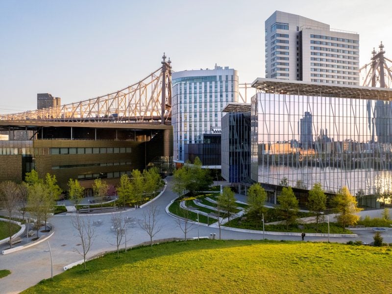 Ariel image of Cornell Tech buildings with grass lawn in front.