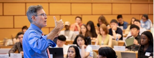 faculty teaching in front of class