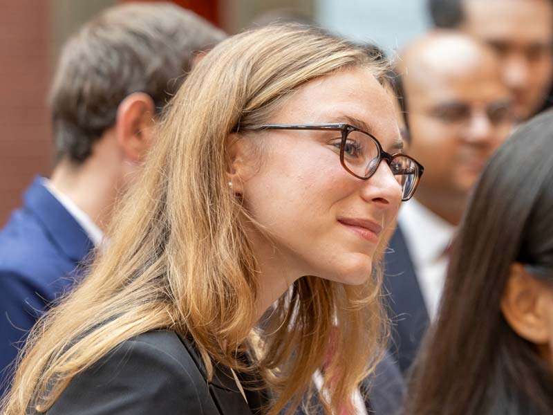 Johnson student leaning in to conversation