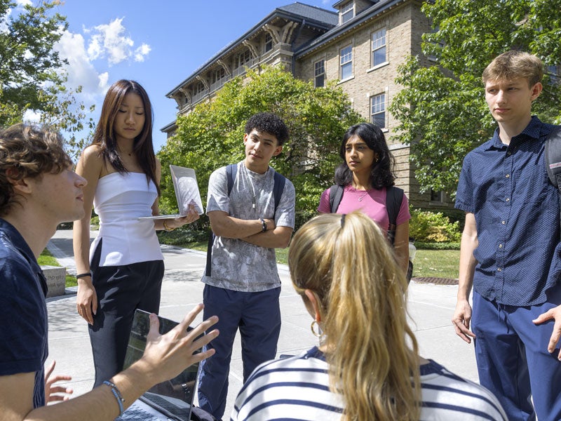 Sarah Jefferis' AEM 2818 class which is part of the Dyson Business school and the grand challenges curriculum which uses writing to create sustainability meets outside on the Ag Quad