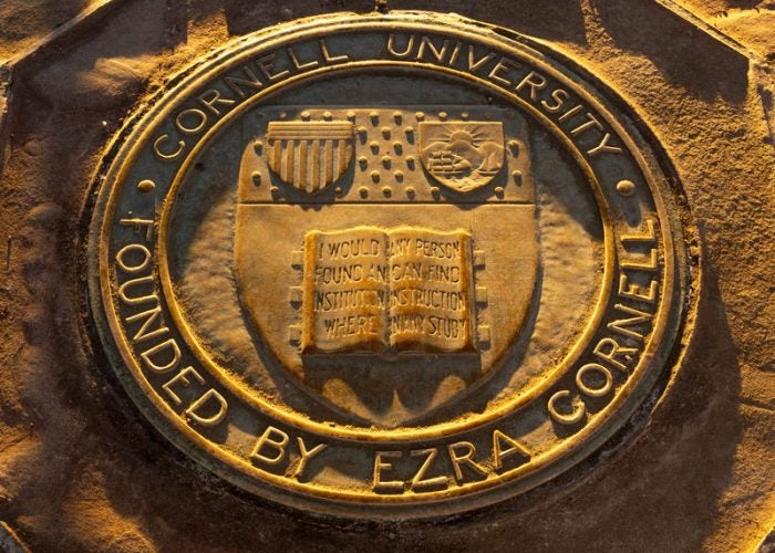 Cornell Seal in sidewalk