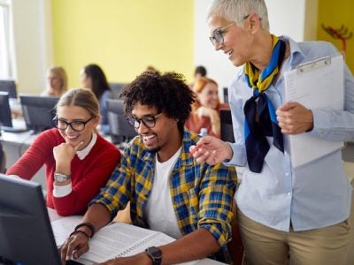 Female professor with students