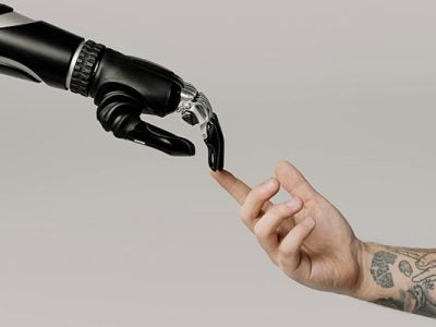 Illustration of a computer generated hand touching a human hand.