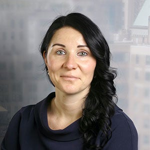headshot of Olga Abrosimova Juin.