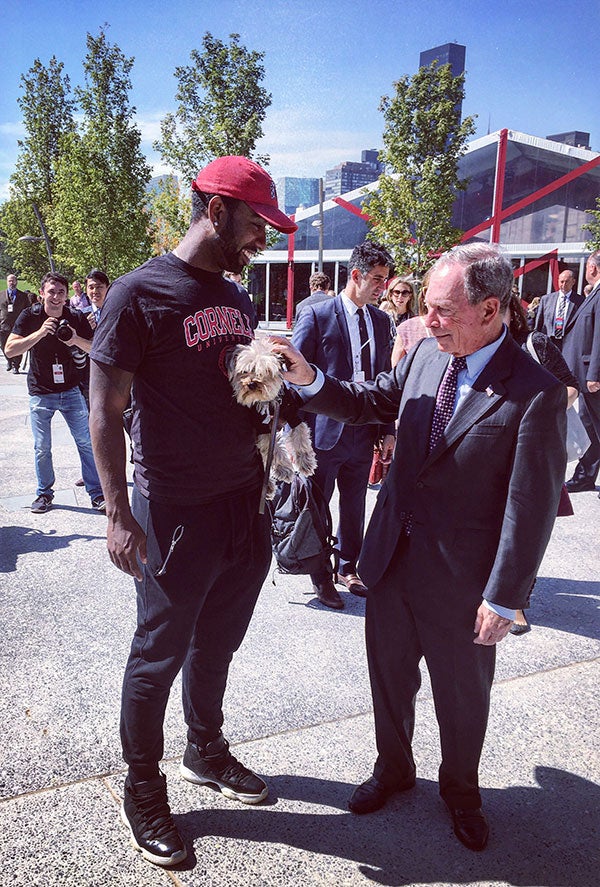Angelo La Roche, MBA &rsquo;18, and his dog Koda meeting Mayor Michael Bloomberg on the morning of the campus&rsquo; official opening