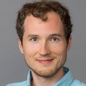 headshot of Artem Streltsov.