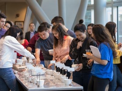 Students eating at the reception