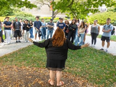 Dyson's AEM 2818 class, led by Sarah Jefferis, meet on the Ag Quad to discuss sustainability through writing.