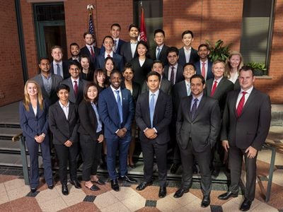 group photo of Cayuga Fund portfolio managers, Class of 2020, in forma business attire