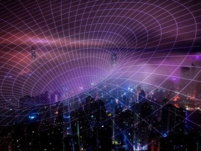 a funnel grid suggesting interconnectivity is superimposed over a city nighttime landscape