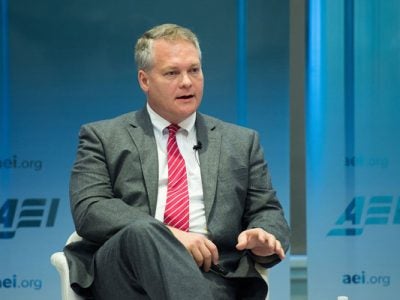 Photo of Chris Barrett talking about food aid with D.C. policymakers