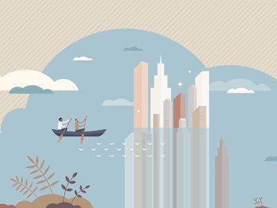 a couple in a canoe paddling towards skyscrapers half submerged in water.