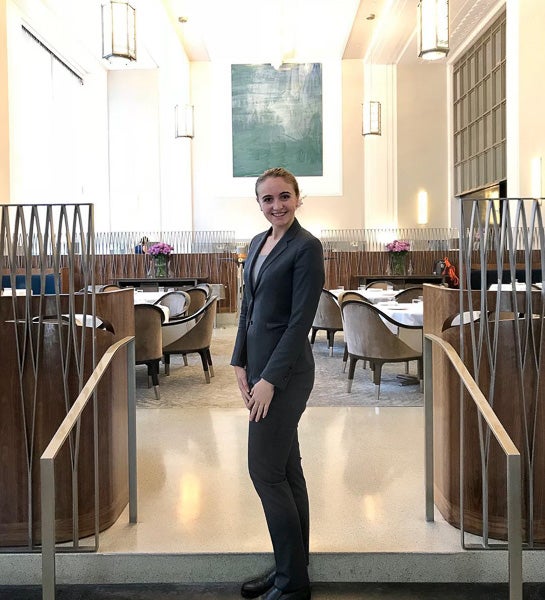 Amanda Lacher posing in front of the lobby