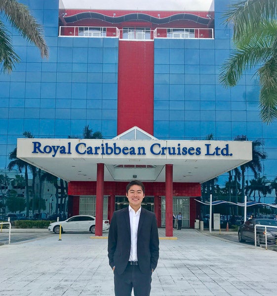 Elvis Ahn in front of Royal Caribbean Cruises Ltd. building
