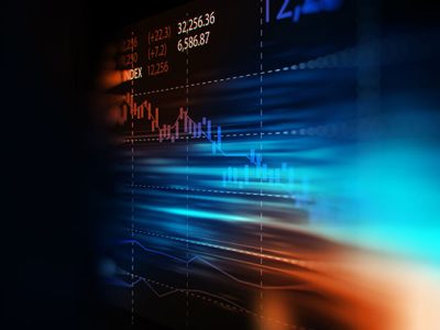 financial graph on technology abstract background – electronic screen at an angle, blurred at either edge