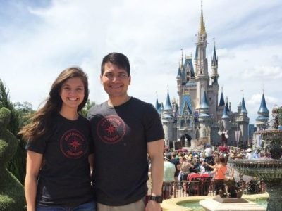 Donnie Hampton, Two-Year MBA 19, and partner Emily Hampton celebrate their choice to go to Johnson with a trip to Disney World