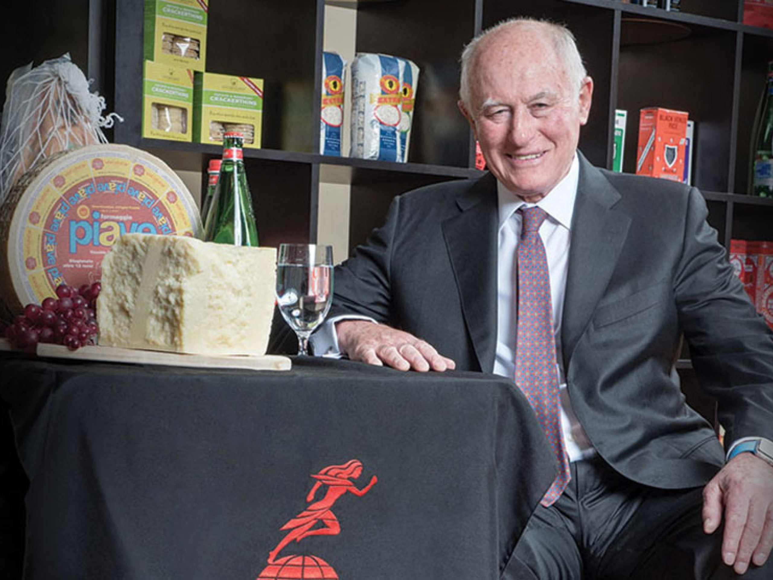 George Gellert poses with products from the Gellert Global Group.