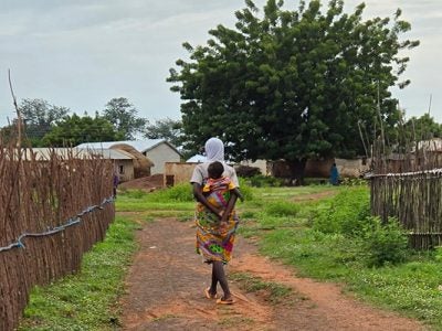 A woman and child in rural Ghana, where high rates of anxiety and depression are quietly shaping the labor market