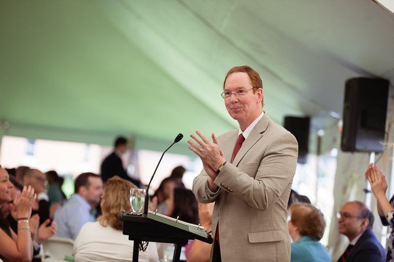 Photo of Mark Nelson at a podium
