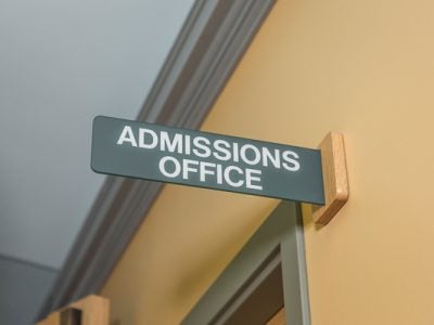 Admissions Office sign on a doorway in Sage Hall