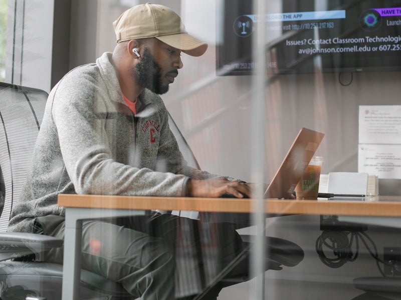 MBA Student working in Breazzano Building