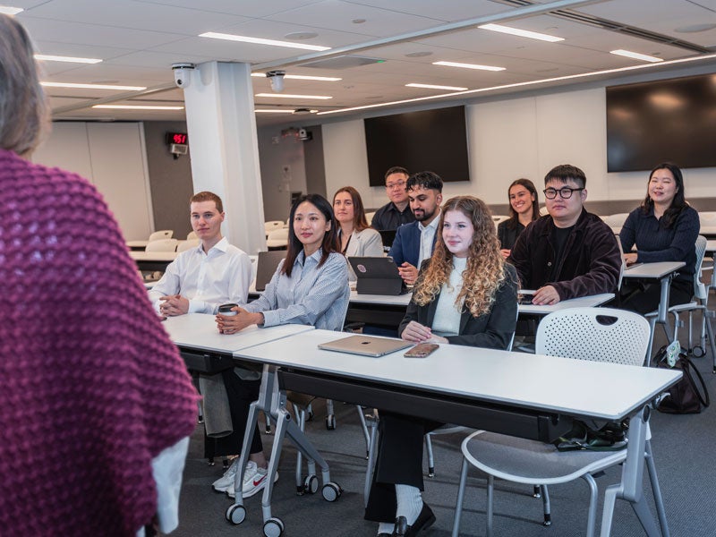 570 Lexington Avenue flat classroom in New York City. Graduate Students in class.