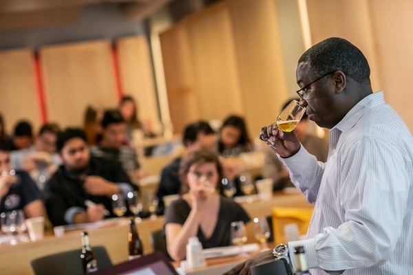 Doug Miller evaluates a beer in his class.