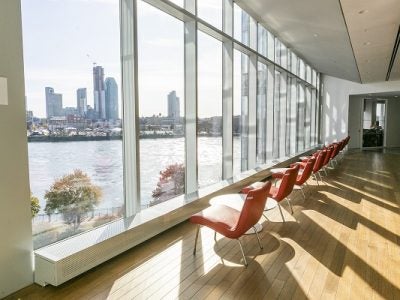 Empty chairs overlook the view from Tata Innovation Center at Cornell Tech.